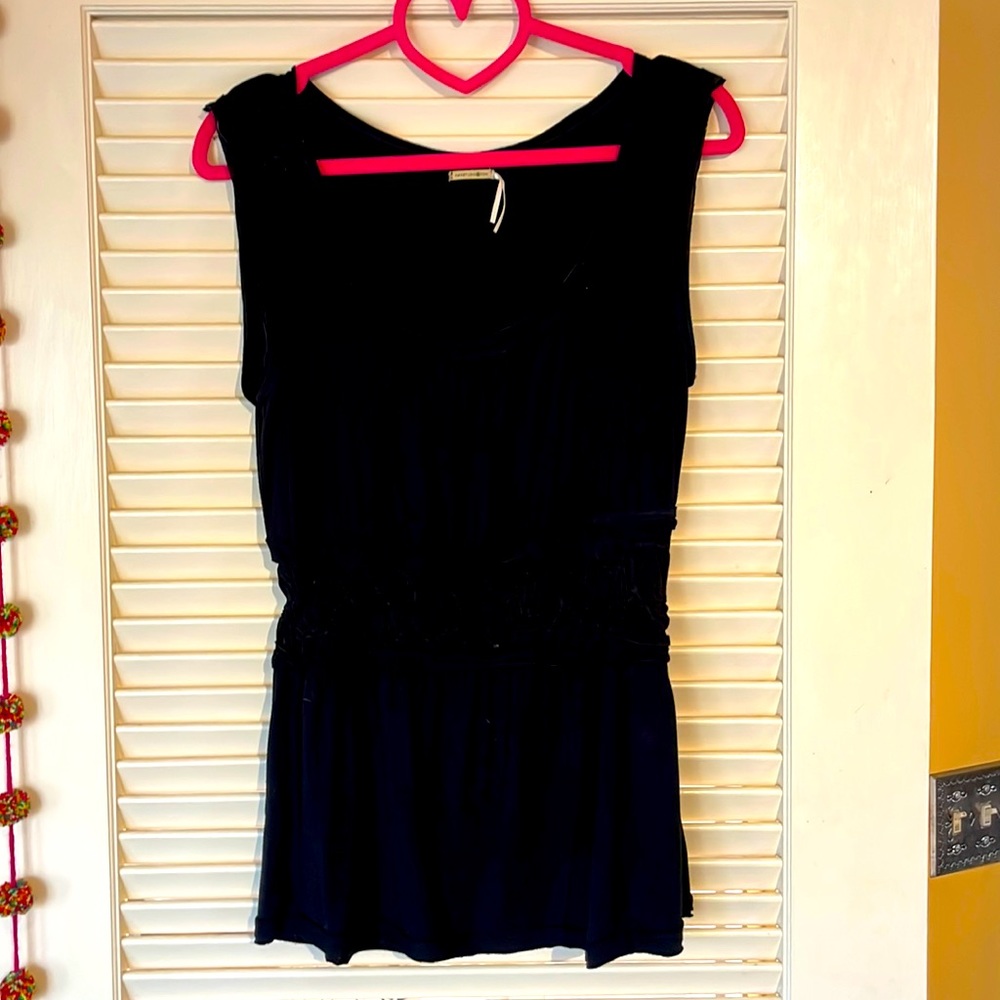 Black stretchy tank top with smocked waist detail. Size small.